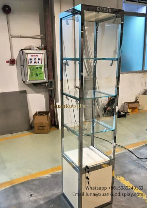 jewellery shop interior design Vietnam Luxury tower display showcase vertical glass cabinet with integrated spot lighting for premium retail store interior