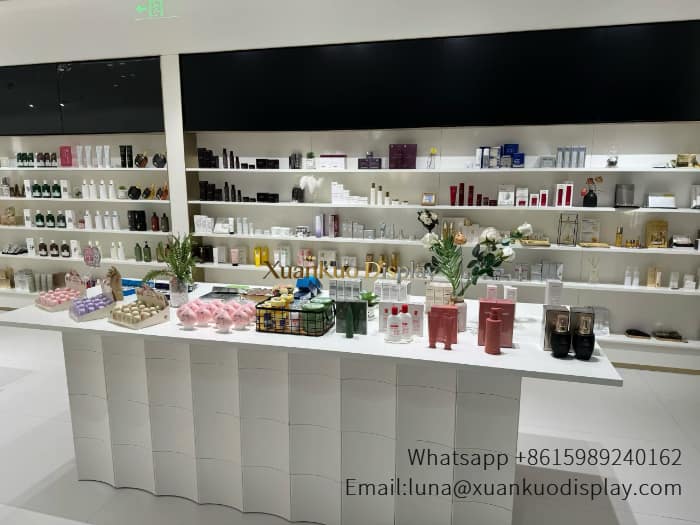 skincare display island with gold metal border