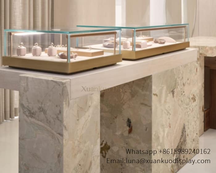 square tabletop jewelry display case with gold frame, sliding glass top and LED light
